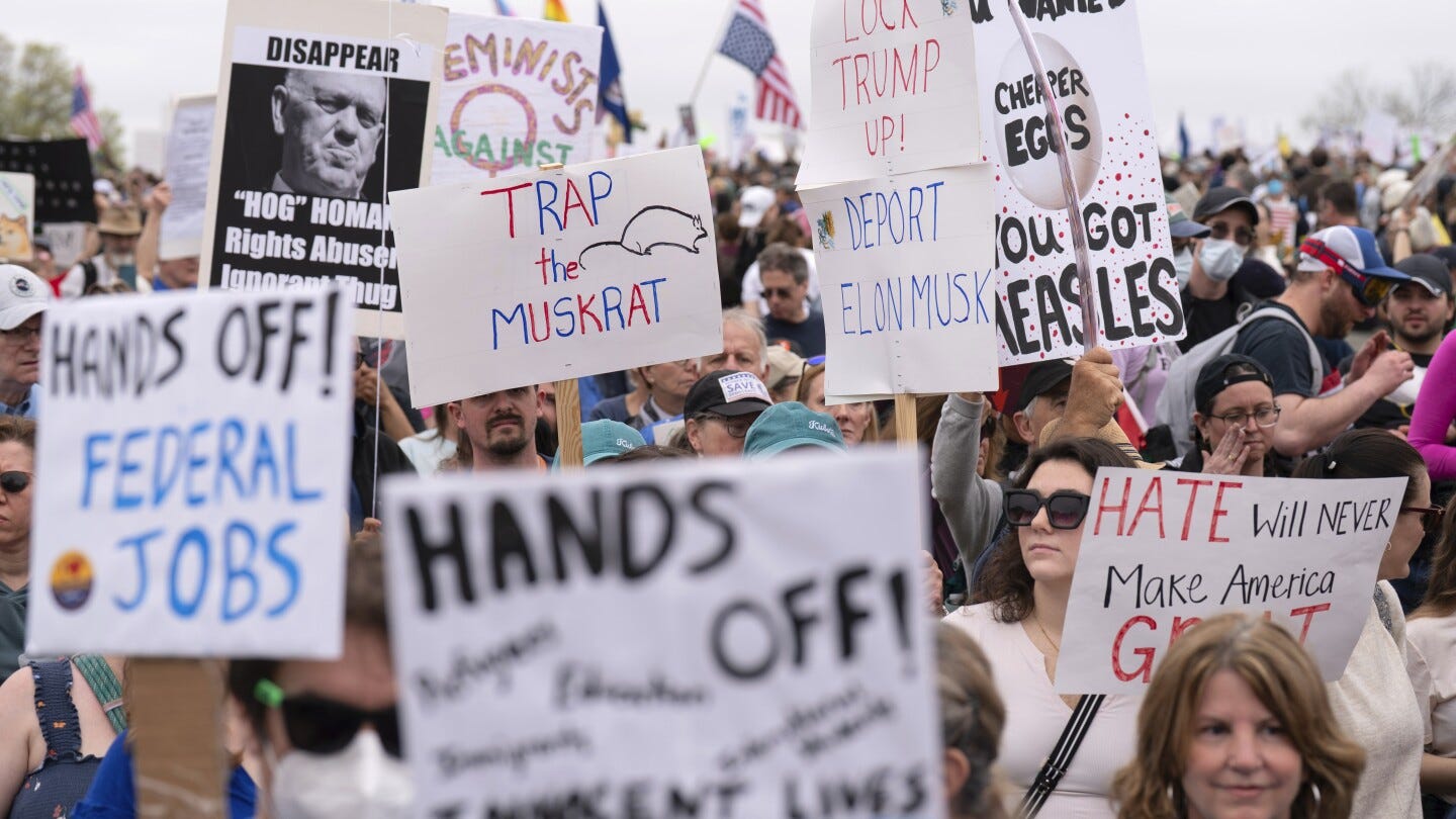 Angry protesters assail Trump, Musk in 'Hands Off!' rallies across US | AP  News