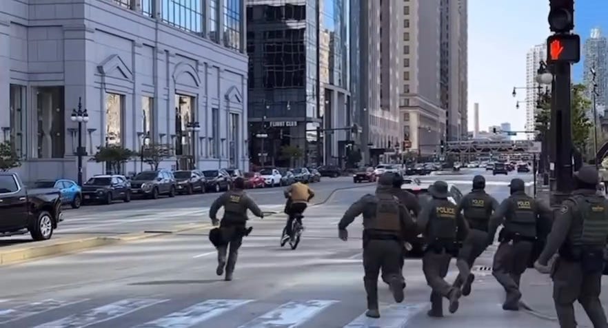 Victim of ICE stormtroopers narrowly escapes on bicycle.