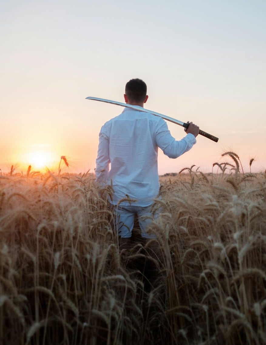 man in white long sleeve shirt holding black microphone