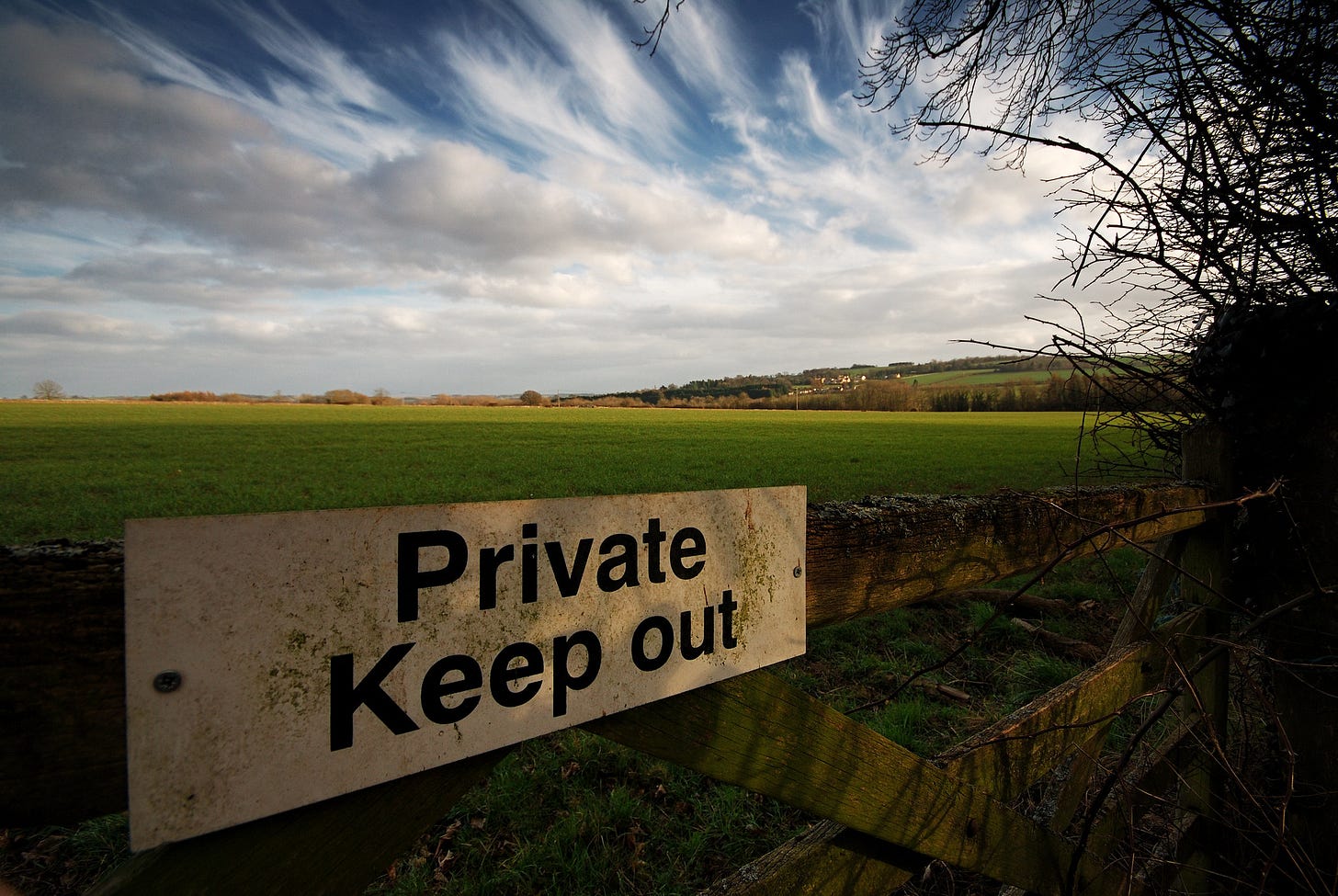 Sign saying 'Private Keep out' by a field in England Sign saying 'Private Keep out' by a field in England