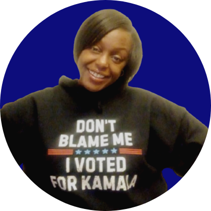 Woman wearing a hoodie that says "Don't Blame Me. I voted for Kamala Harris"