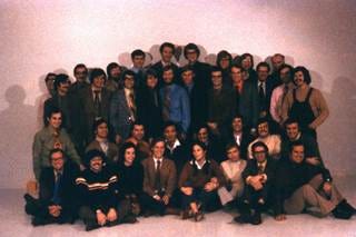 A group of people posing for a photo

AI-generated content may be incorrect.