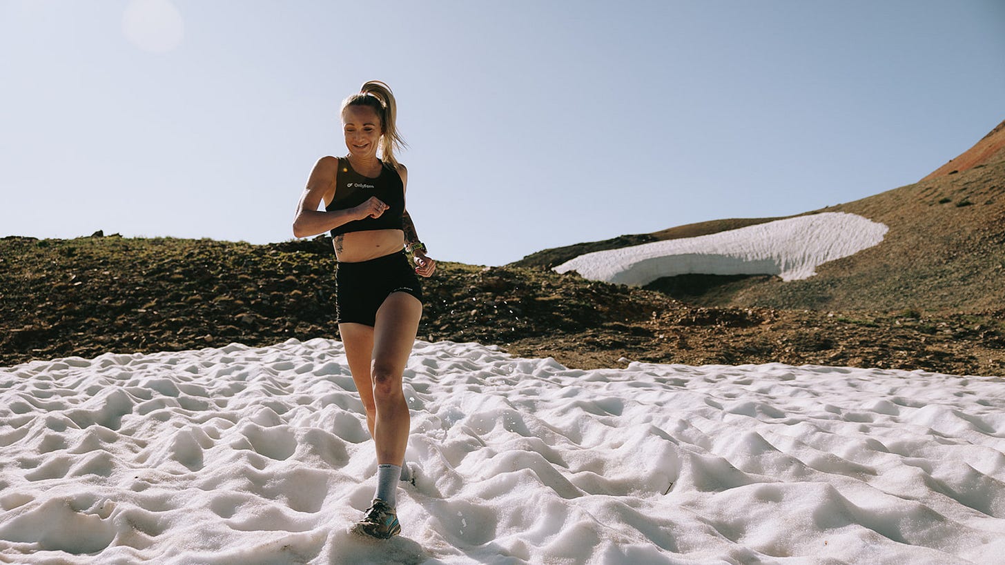 Sabrina Stanley runs on snow