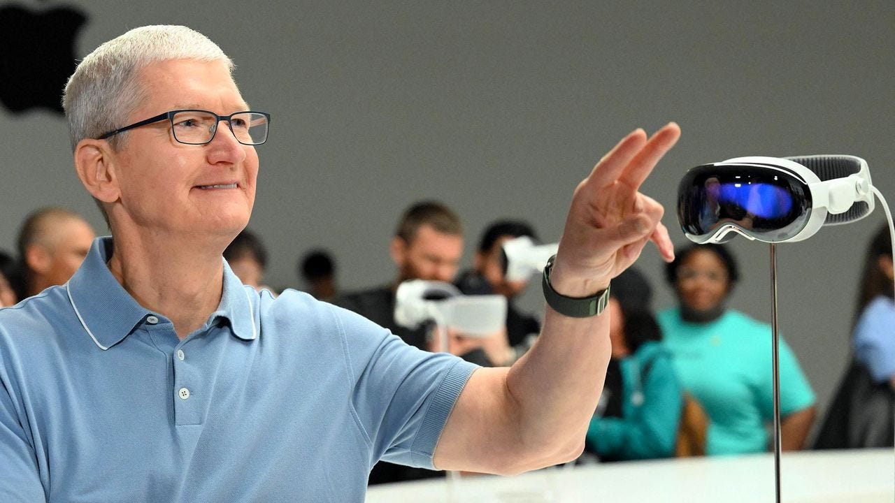 Tim Cook introducing Apple Vision Pro at a product launch event