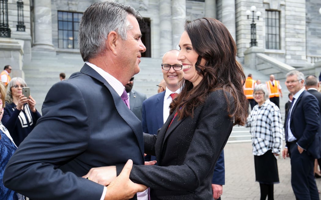 Jacinda Ardern hugs her father, Ross Ardern, after she was sworn in as prime minister in October 2017.