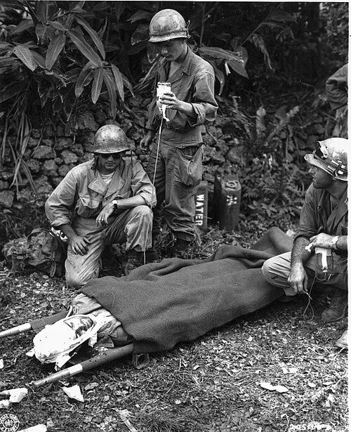 File:SC 205108-S - Capt. James R. Barron, Corpus Christi, Texas, is given plasma by front-line aid men after being wounded by a Japanese sniper on Okinawa. 4 April, 1945. (51361185224).jpg File:SC 205108-S - Capt. James R. Barron, Corpus Christi, Texas, is given plasma by front-line aid men after being wounded by a Japanese sniper on Okinawa. 4 April, 1945. (51361185224).jpg