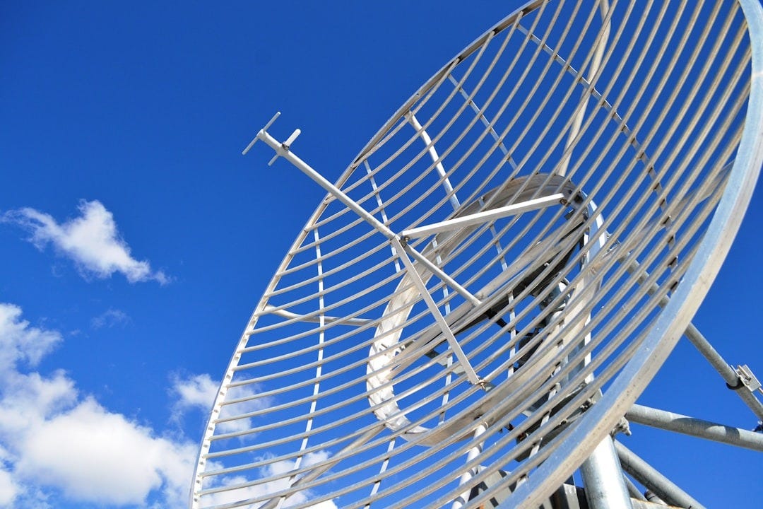 white ferris wheel under blue sky during daytime