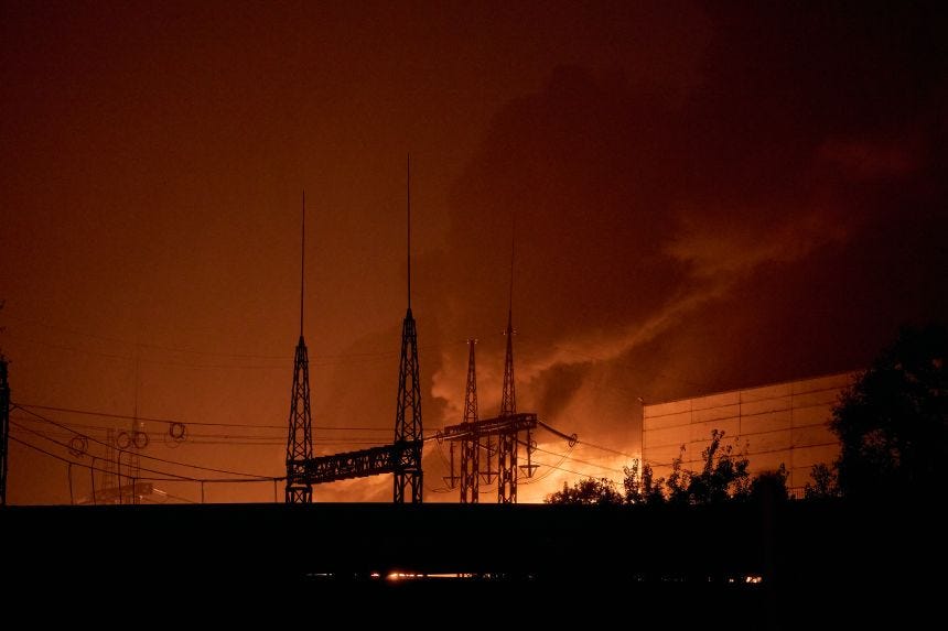Firefighters battle flames at a thermal power plant following a series of explosions in Kyiv, Ukraine, on October 10, 2025.