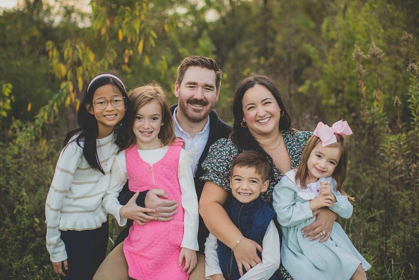 May be an image of 5 people and baby