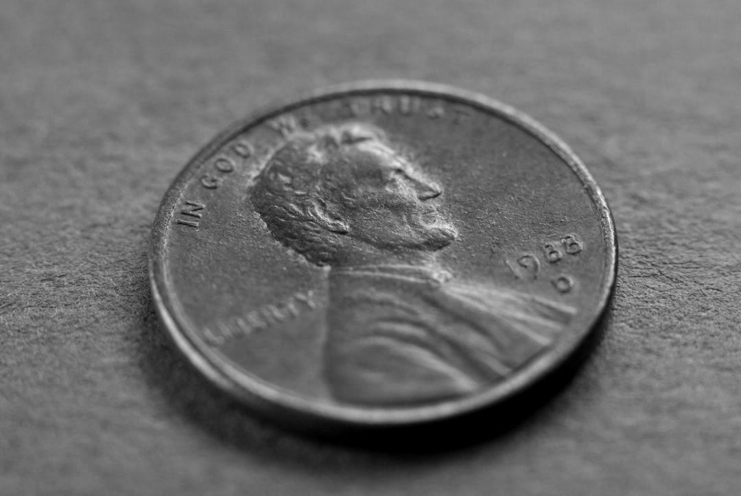 A close up of a penny on a table