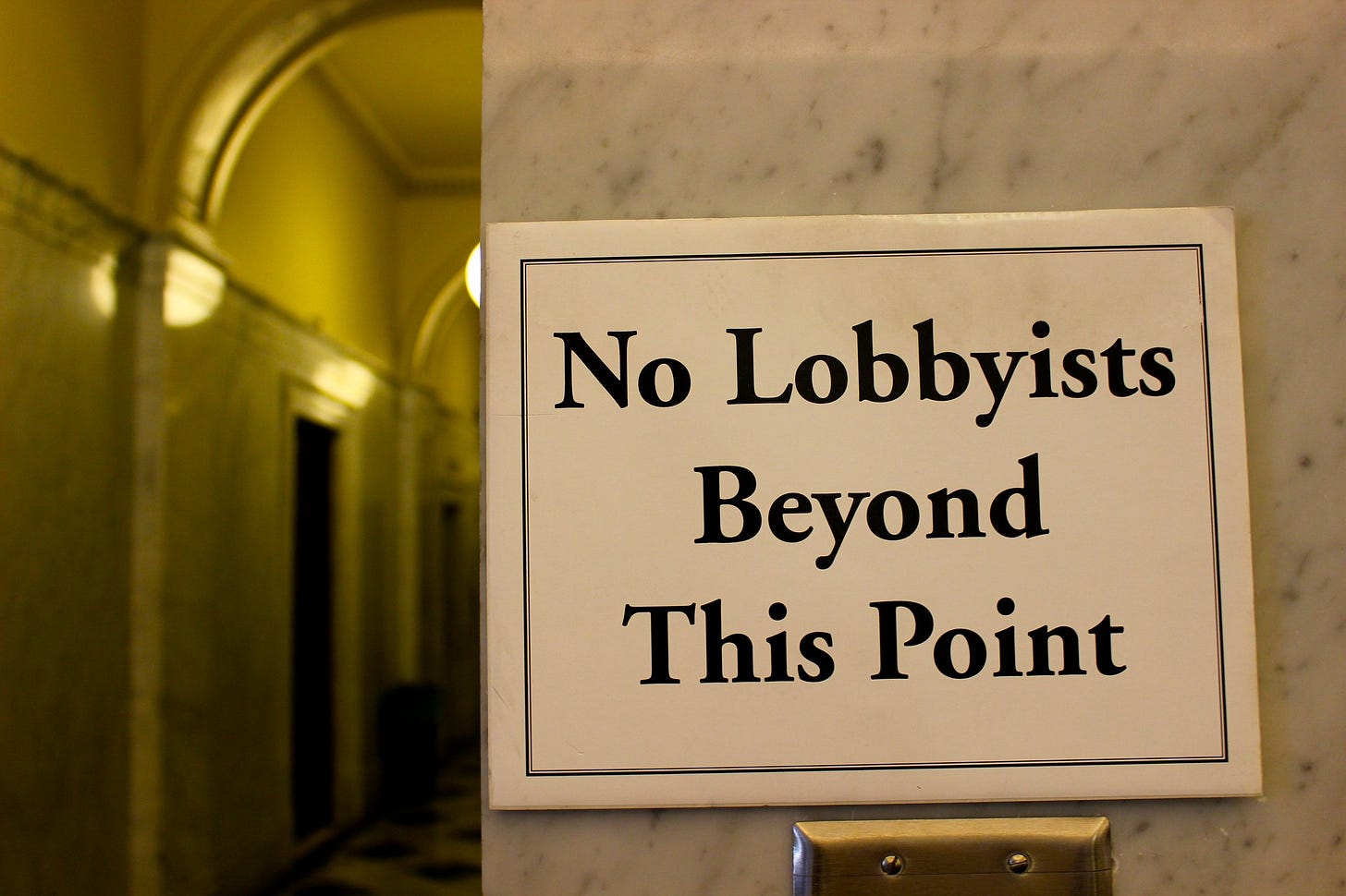'No lobbyists beyond this point' sign