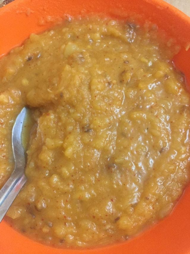 Orange paste in an orange bowl. Orange paste in an orange bowl.