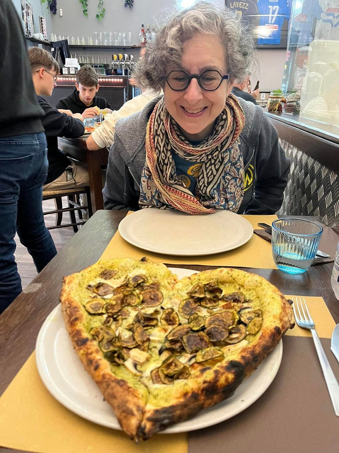 May be an image of 4 people and pizza May be an image of 4 people and pizza