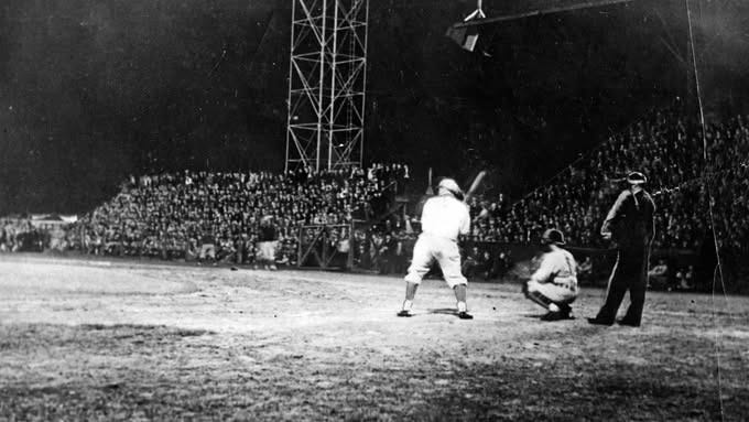 Home plate scene on May 2, 1930 in Des Moines, an early minor-league night game.
