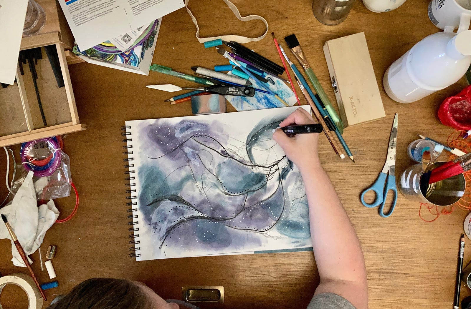 Stephanie Swilley working on her art Stephanie Swilley working on her art