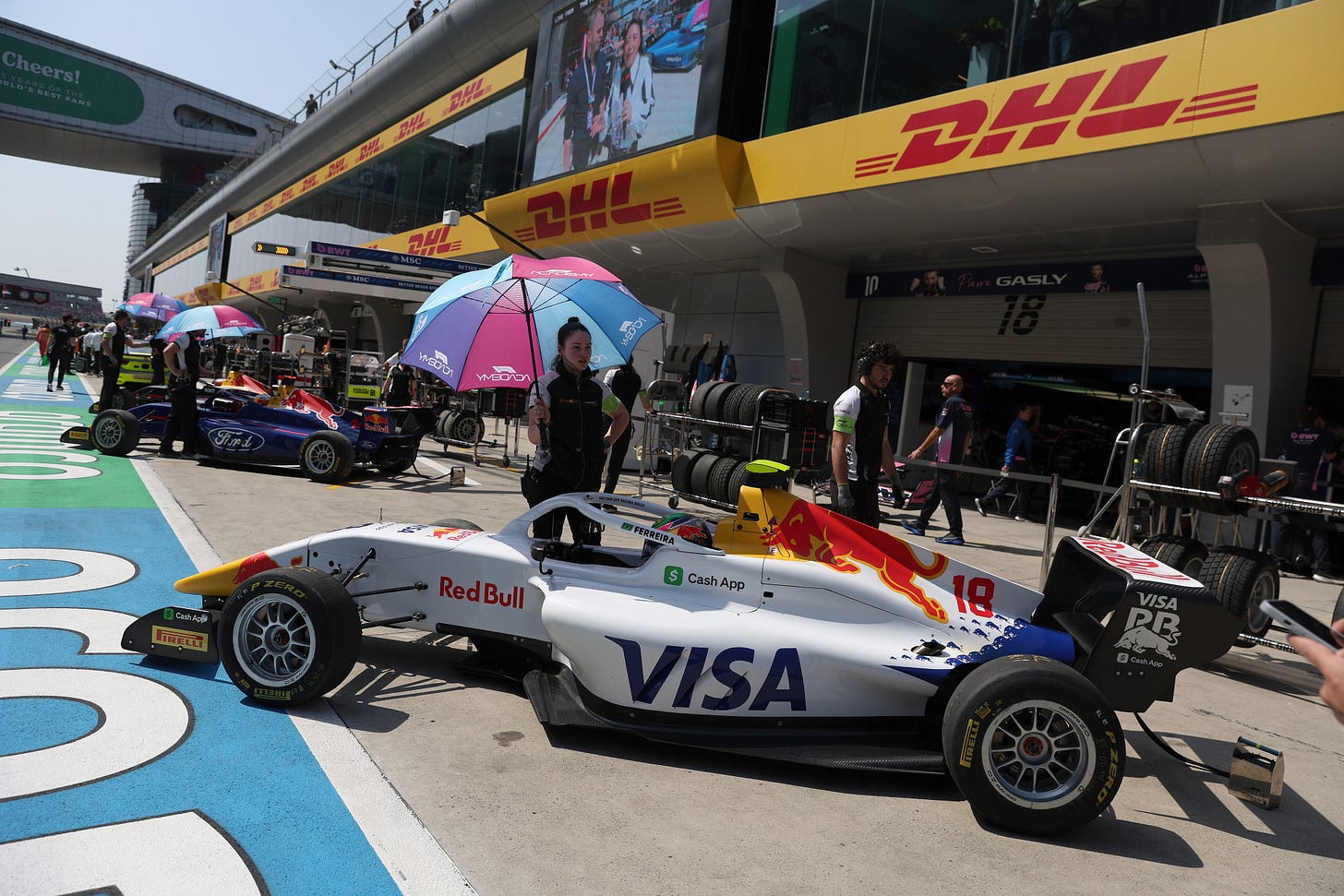Rafaela Ferreira, Campos Racing driver, outside the garage during F1 Academy Round 1, race 1 at Shanghai International Circuit on March 22, 2025 in Shanghai, China. - Photo credit: Meg Oliphant/Getty Images/Red Bull Content Pool. Rafaela Ferreira, Campos Racing driver, outside the garage during F1 Academy Round 1, race 1 at Shanghai International Circuit on March 22, 2025 in Shanghai, China. - Photo credit: Meg Oliphant/Getty Images/Red Bull Content Pool.