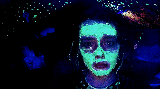 Casey with glow-in-the-dark paint on her face in We’re All Going to the World’s Fair