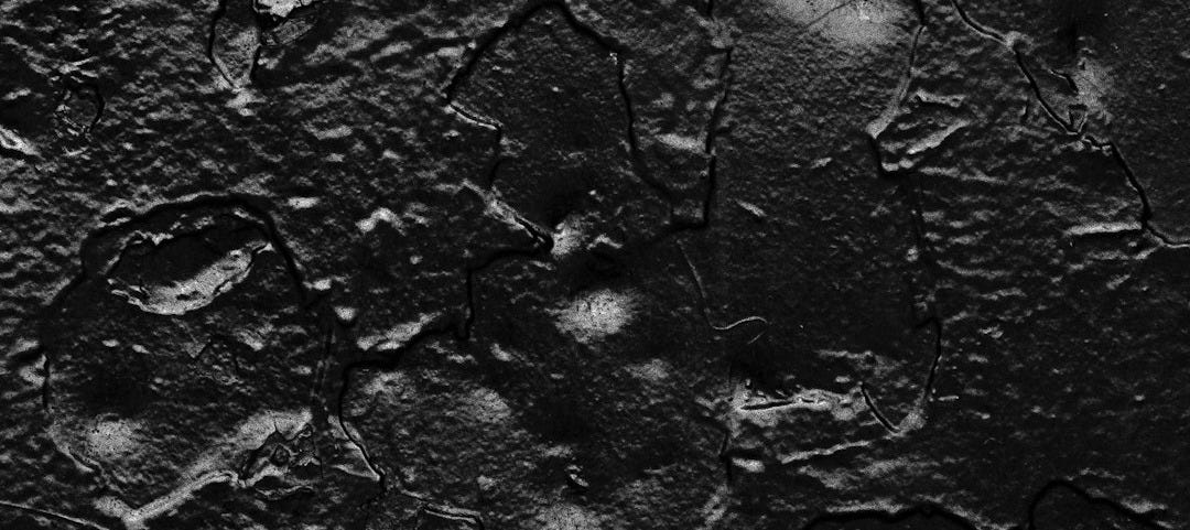 water droplets on gray concrete surface water droplets on gray concrete surface