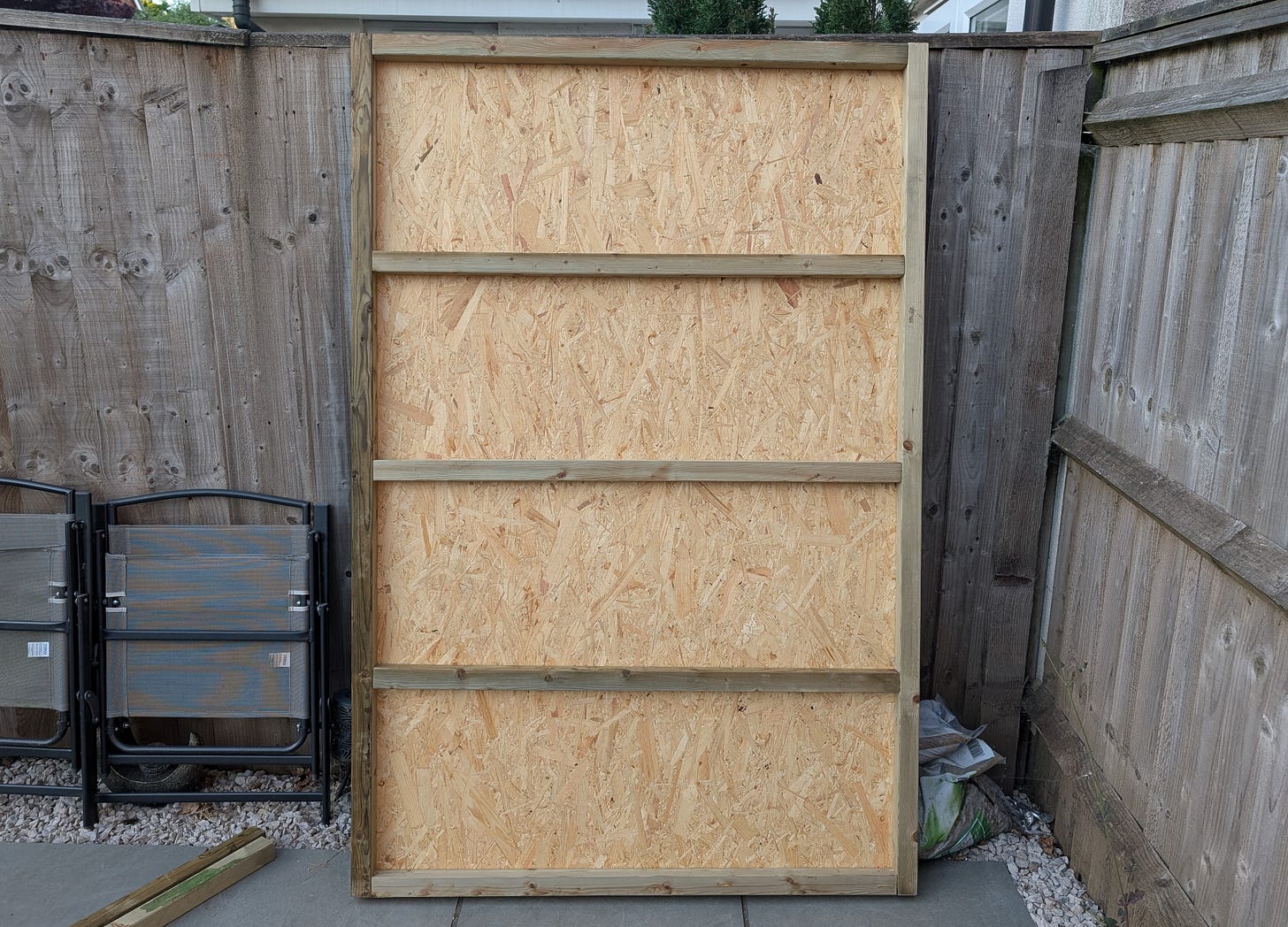 Completed wooden shed base with OSB floorboards installed