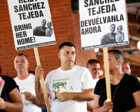 people hold signs that read 'Heidy Sanchez Tejeda bring her home' people hold signs that read 'Heidy Sanchez Tejeda bring her home'