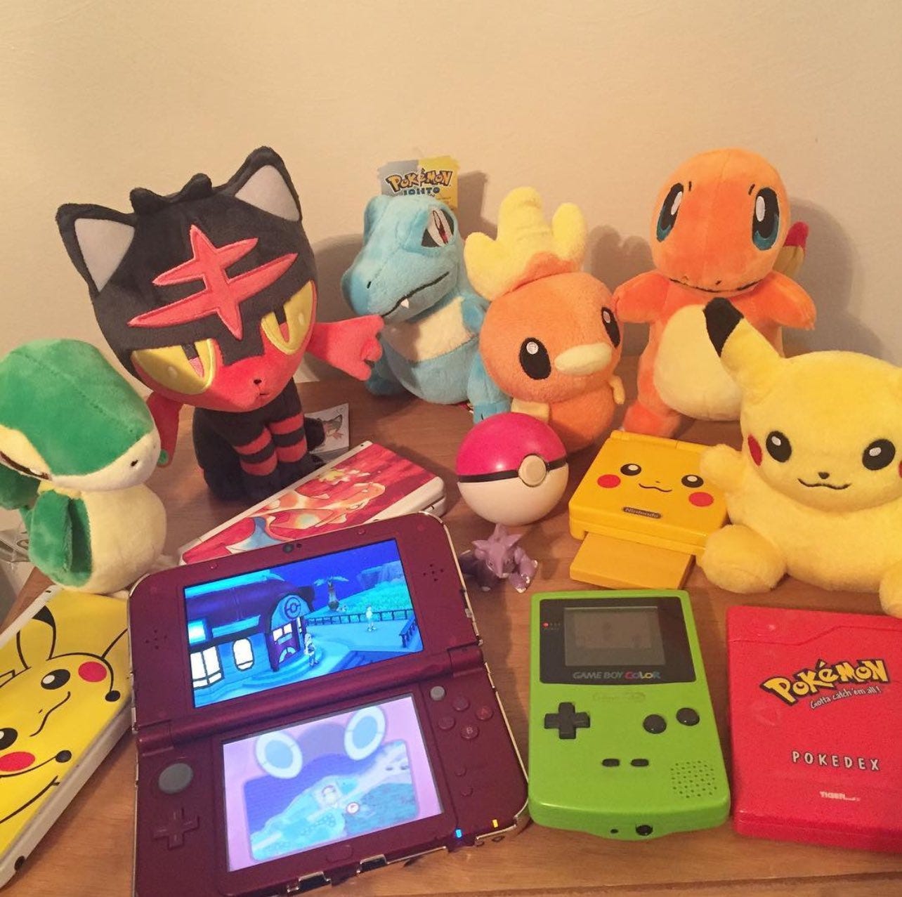 Justin has collected a ton of cool Pokémon items throughout the years, including plushies, limited edition consoles, and figures Justin has collected a ton of cool Pokémon items throughout the years, including plushies, limited edition consoles, and figures