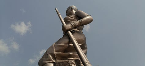 Pictures of the artwork on sale at the Marche des Arts de Cotonou, the Amazone statue, the Benin Congress building, and the second largest graffiti wall in the world