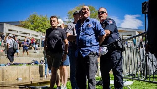 George Zinn is arrested after Charlie Kirk was shot during Turning Point&#x002019;s visit to Utah Valley University in Orem on Wednesday, Sept. 10, 2025.