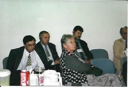 A group of people sitting in chairs

AI-generated content may be incorrect.