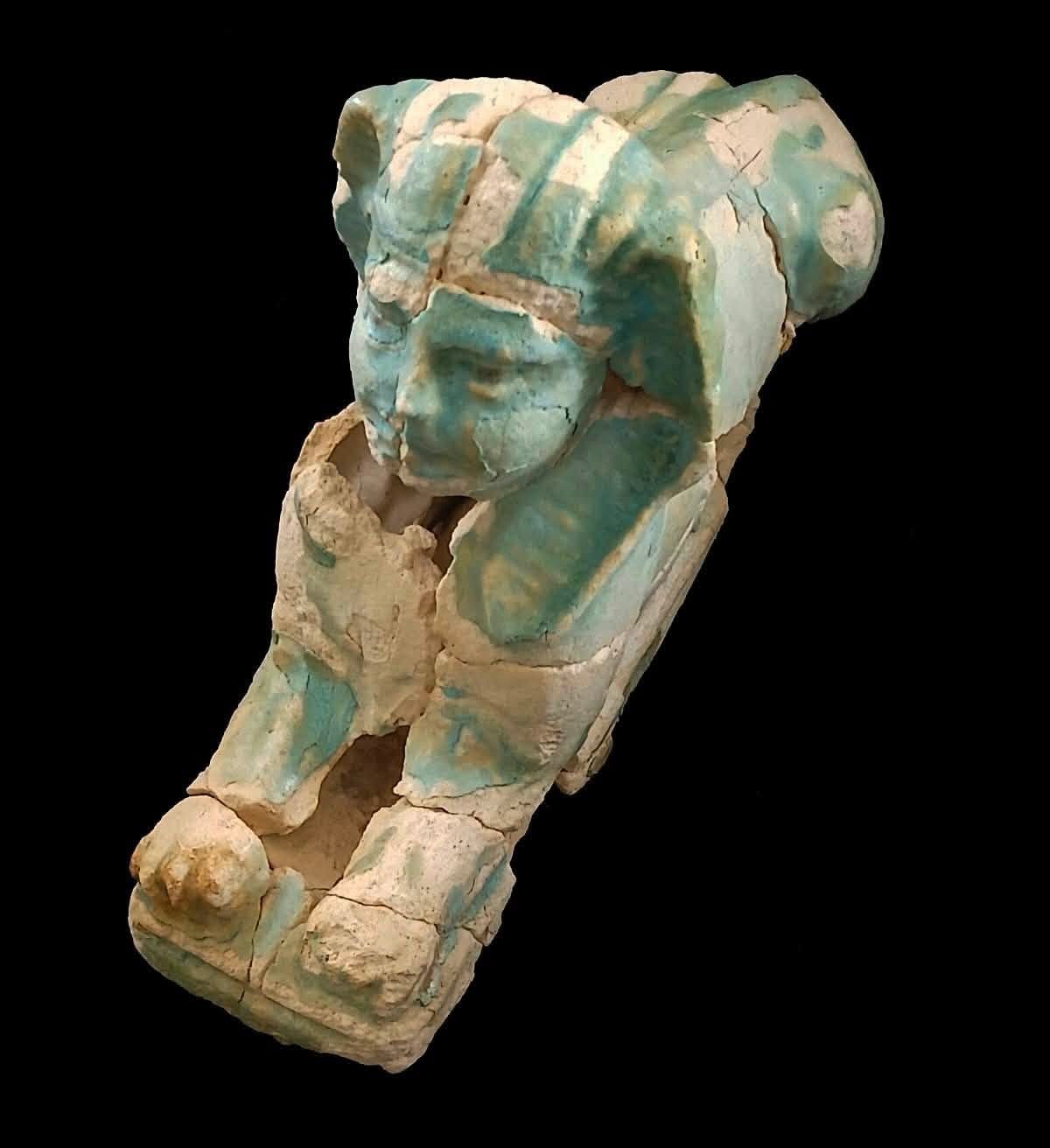 The plaster sphinx statue found at Marina El Alamein, discovered beside the sealed granite sarcophagus in one of the tombs. 