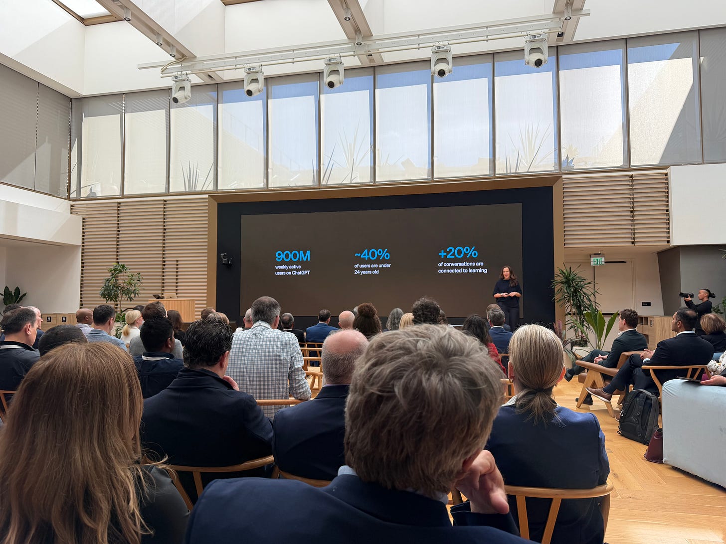 Leah Belsky presenting on the number of ChatGPT users