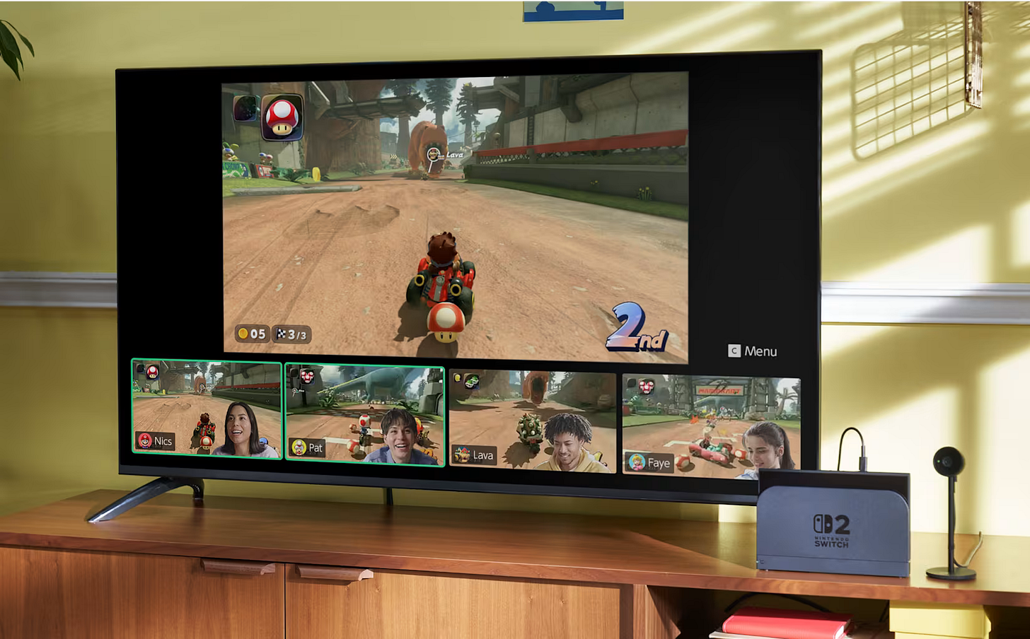 image of a TV with the new Mario Kart being played, with smaller video feeds of others playing Mario Kart right below it.