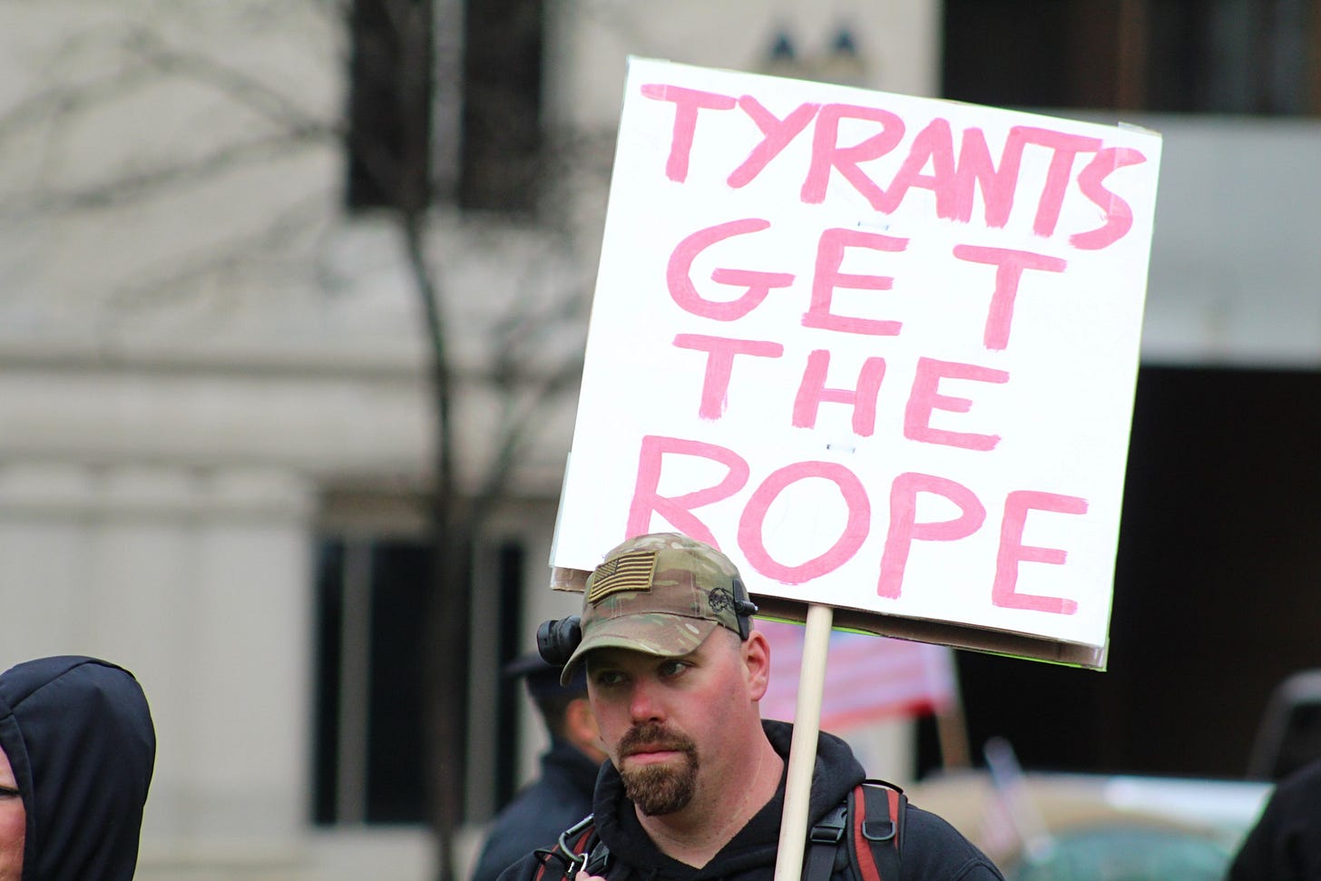 Tyrants Get The Rope': Small anti-Whitmer protest rocks Capitol, reporter  hit by gun • Michigan Advance