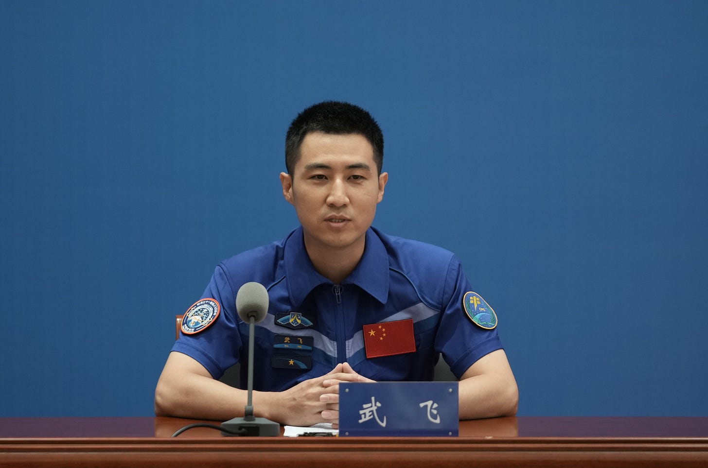 Wu Fei pondering the remainder of his answer while talking to a reporter on August 5th 2026. Wu Fei pondering the remainder of his answer while talking to a reporter on August 5th 2026.