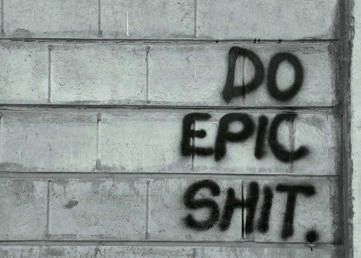 Photo of wall graffiti that says DO EPIC SHIT