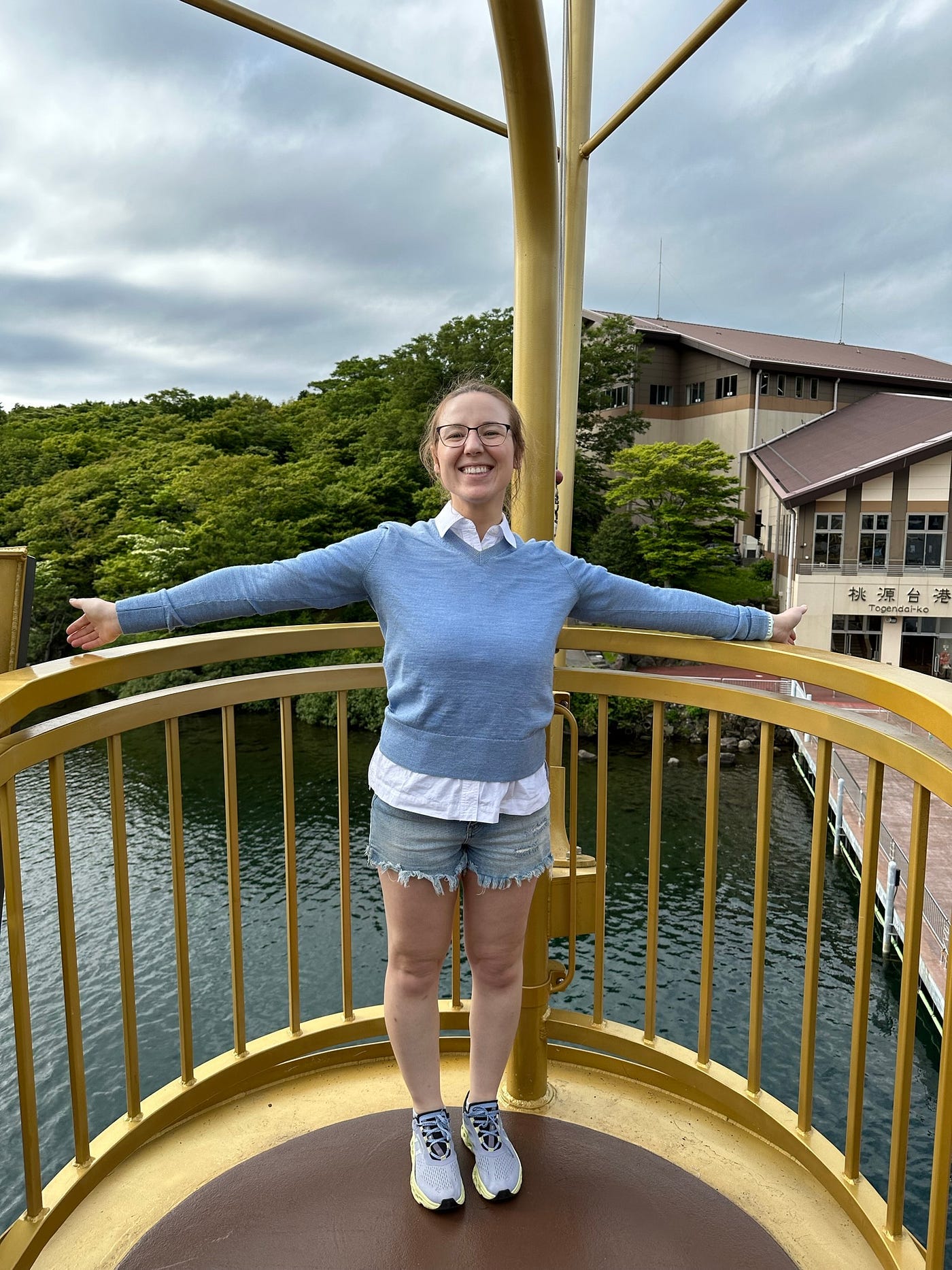 Mari-Alina Timoshchuk on a ferry doing the Titanic pose