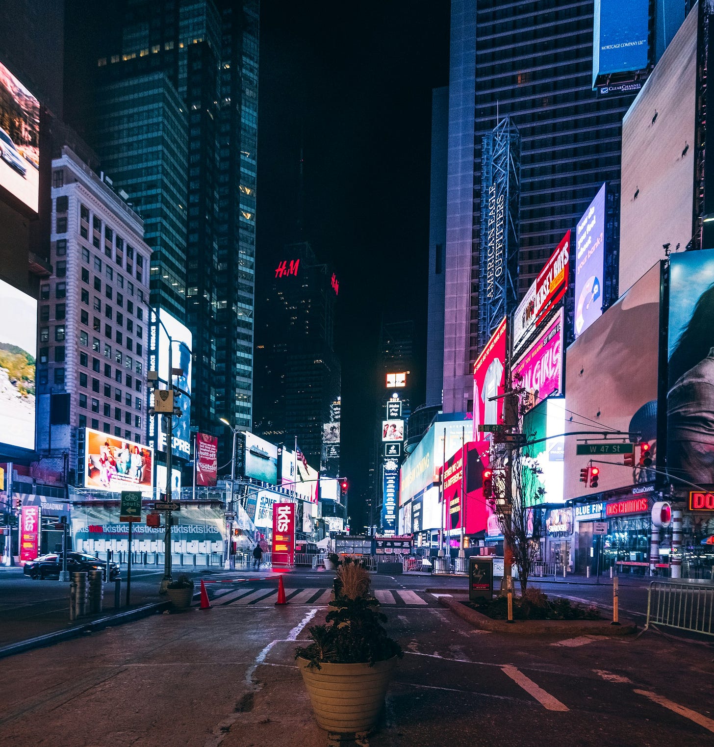 people walking on street during night time