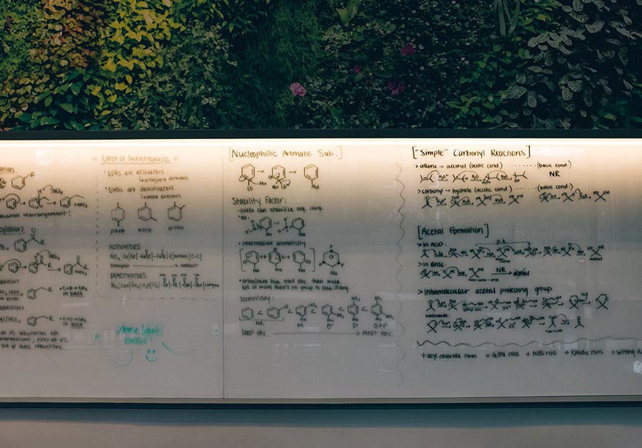 formulas on a whiteboard