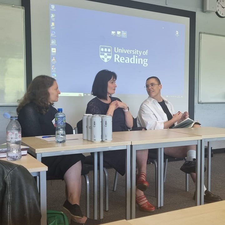 I the first image three white women with dark hair sit in a row. They are speaking on the panel "Finding Book Cultures Outside the Centre", the middle woman is Kim Wilkins, the woman to the right is Alex Dane. The second image is a photo of a canvas tote bag, it is red with the logo for SHARP 2024: Global Book Cultures in cream writing.