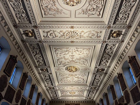 Portraits, stained glass, and a gilded plaster ceiling from the Great Hall at Barts North Wing.