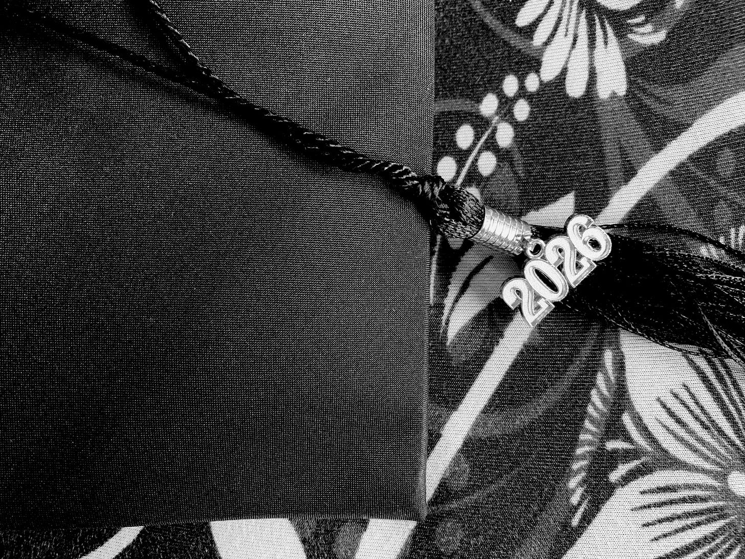 Black and white photograph of a graduation mortarboard cap with a 2026 tassel Black and white photograph of a graduation mortarboard cap with a 2026 tassel