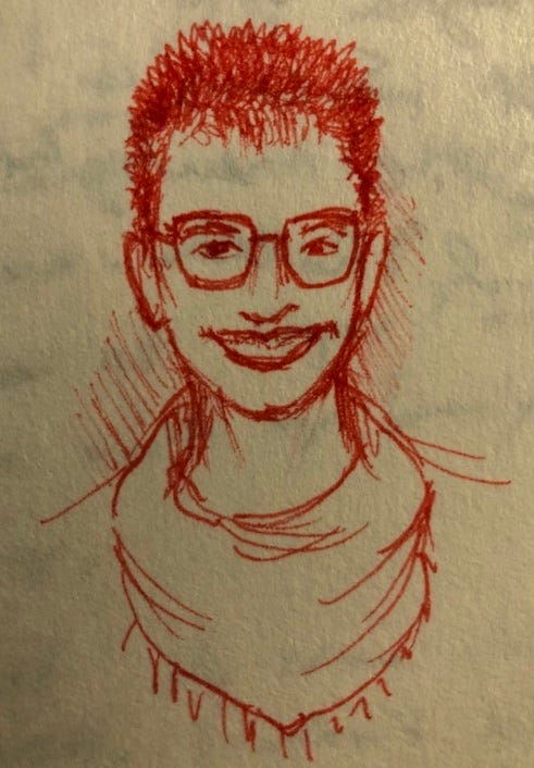 Sketch of Sara's face in red ink.