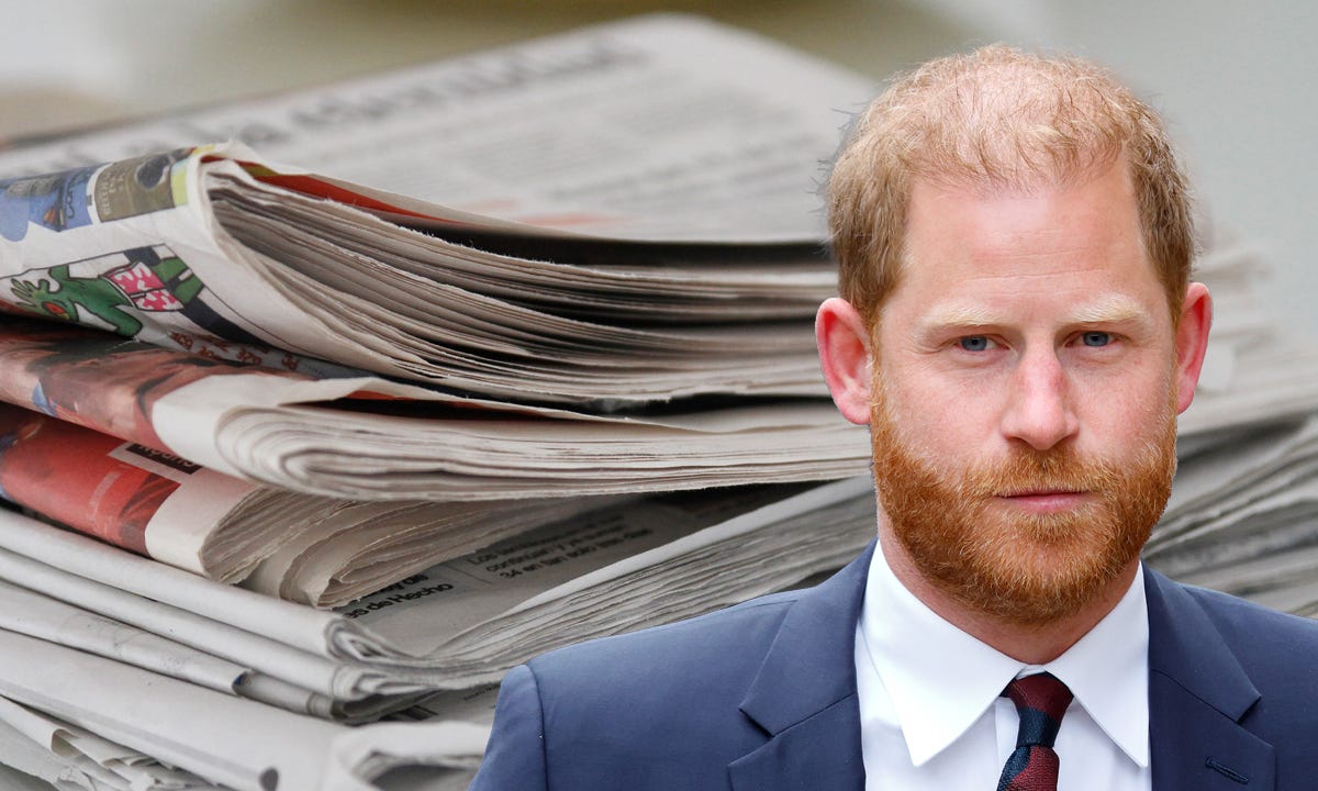 Cut-out of a suited Prince Harry's head and shoulders against a background of a pile of newspapers