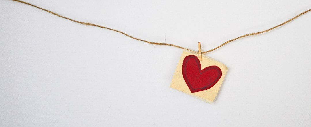heart-shaped red and beige pendant