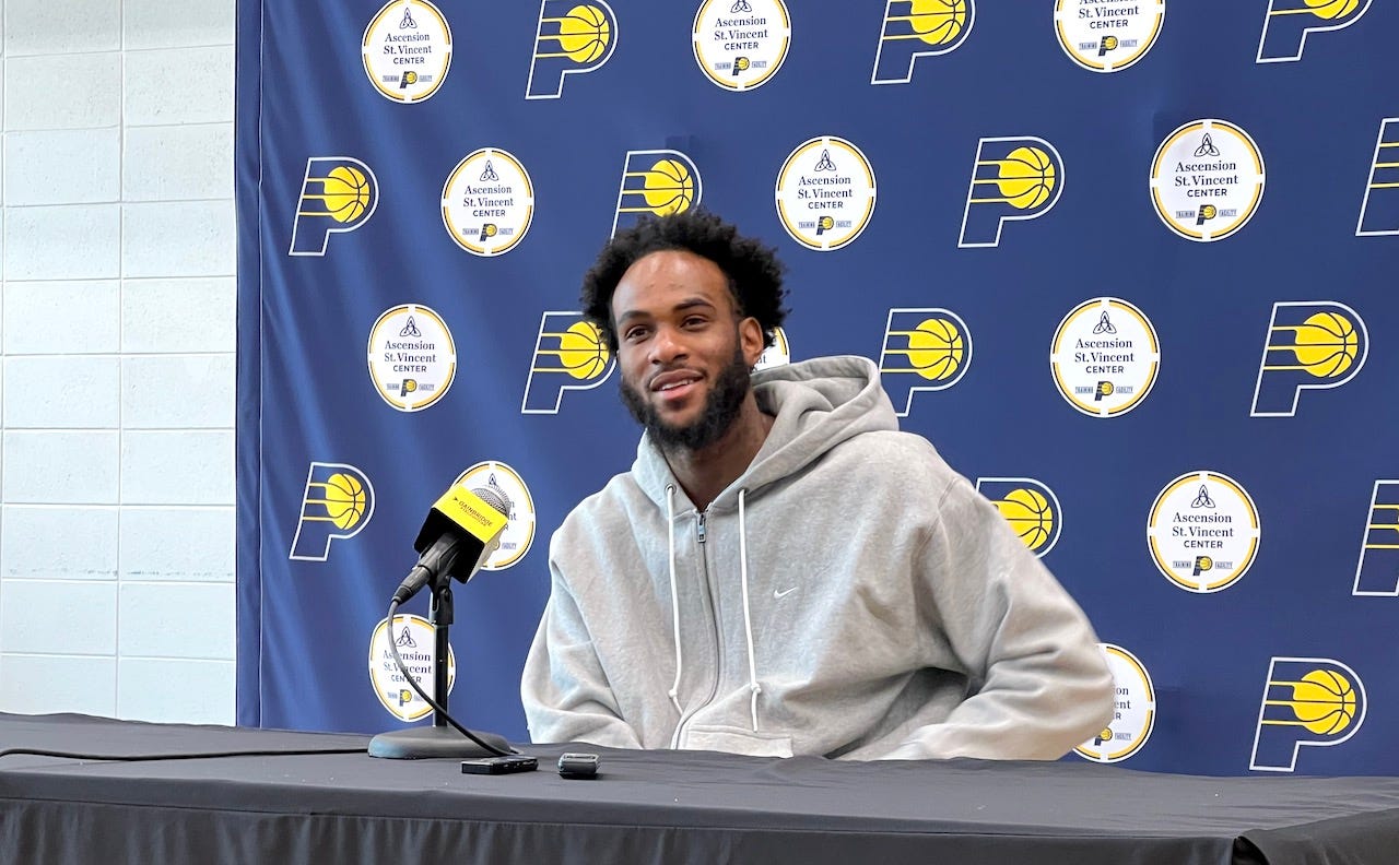 Pacers forward Oshae Brissett talks to media during exit interviews.