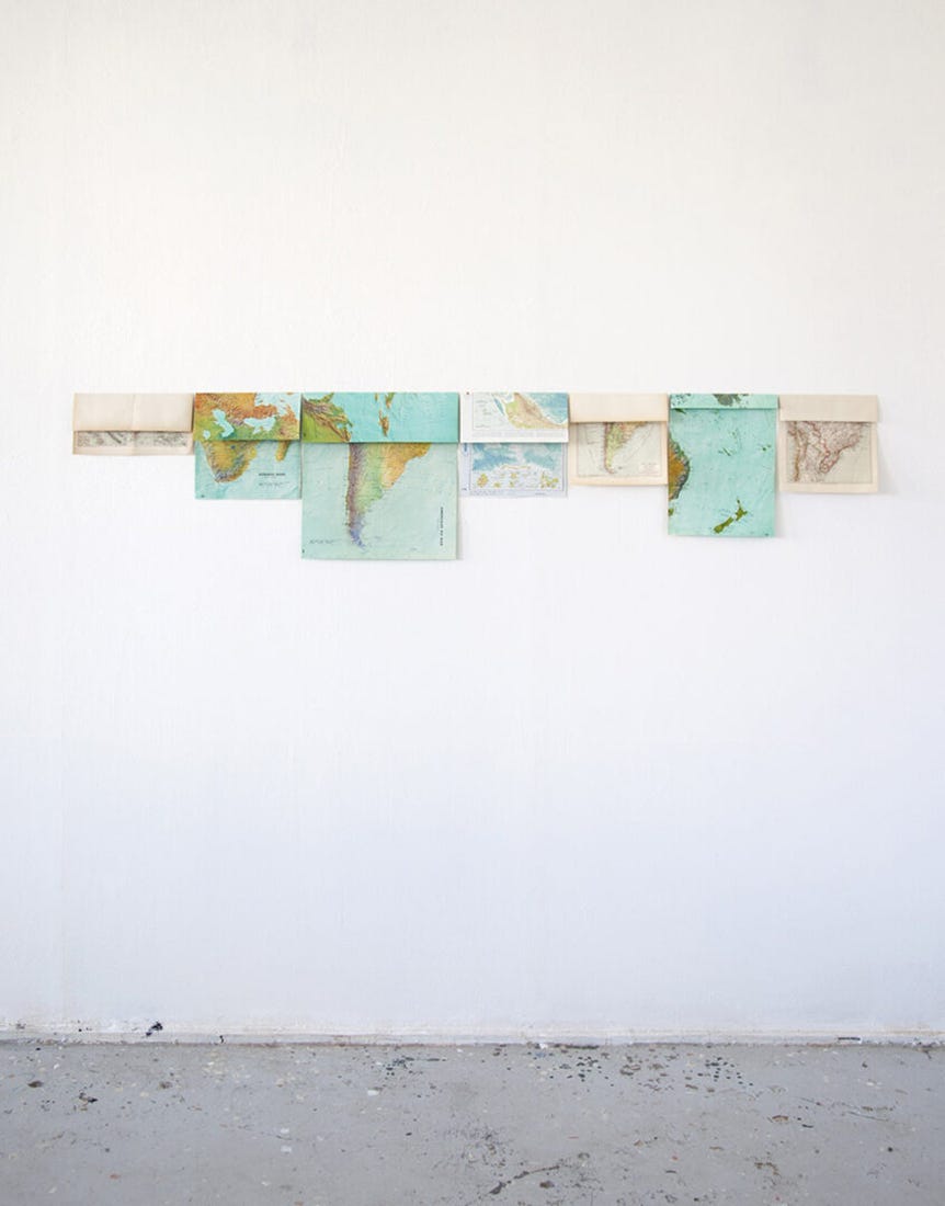 Marina Camargo, Ao sul (abaixo da linha do Equador), (installation with maps), 2015 [Galeria Superfí­cie, São Paulo. © Marina Camargo]