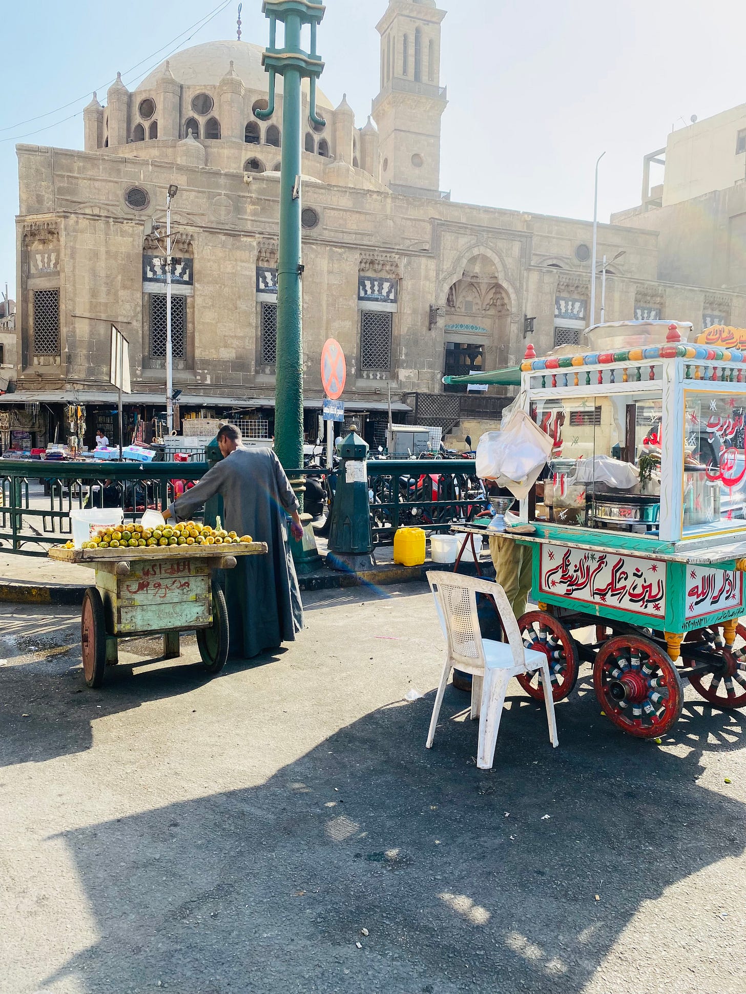 A man sets up his fruit cart in Cairo.