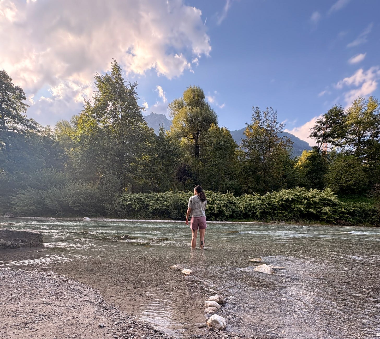 The author's wife Lisa standing in the Loisach river