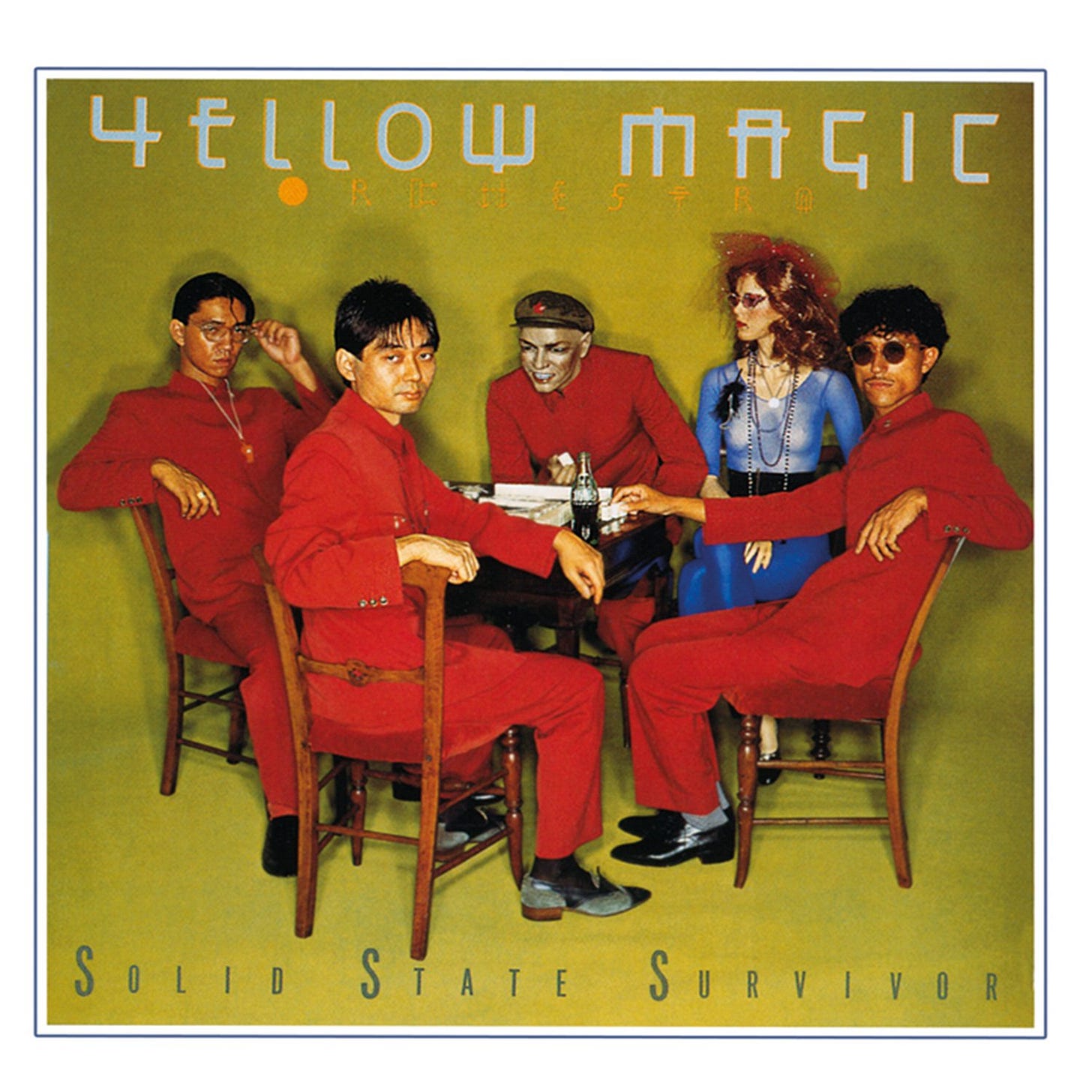 Yellow Magic Orchestra solid state survivor cover; image shows three band members sitting at table in red outfits; there are two dummies, one male one female, sitting with them