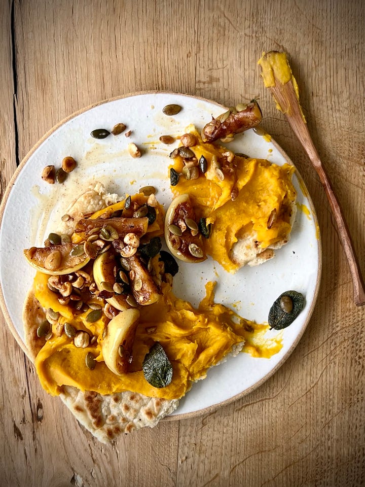 Pumpkin hummus flatbreads with fried apple and sage in various states of eating