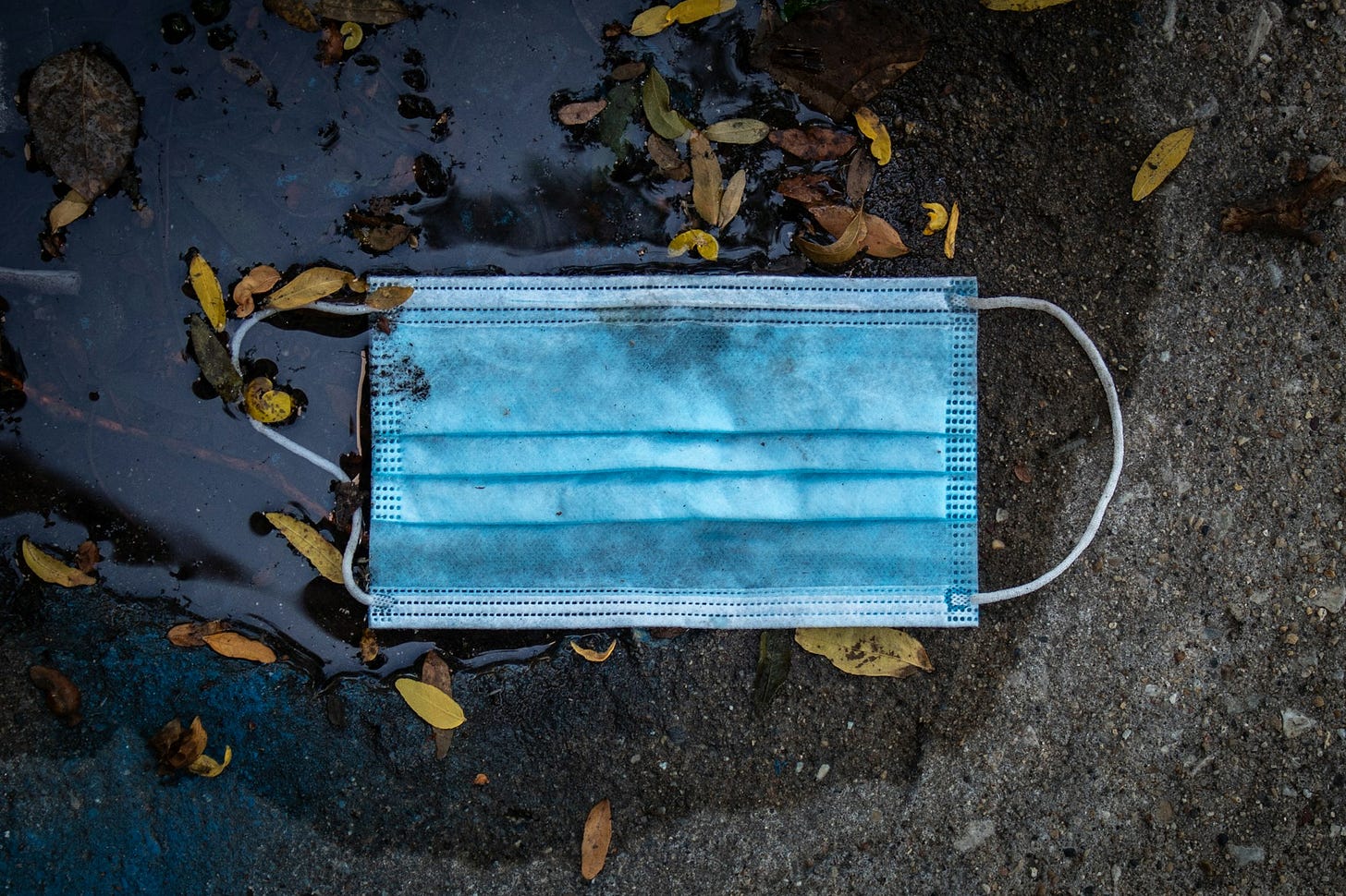 blue mask on gray concrete floor